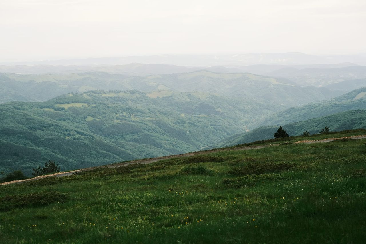 Wide panorama of layered green Balkan mountains