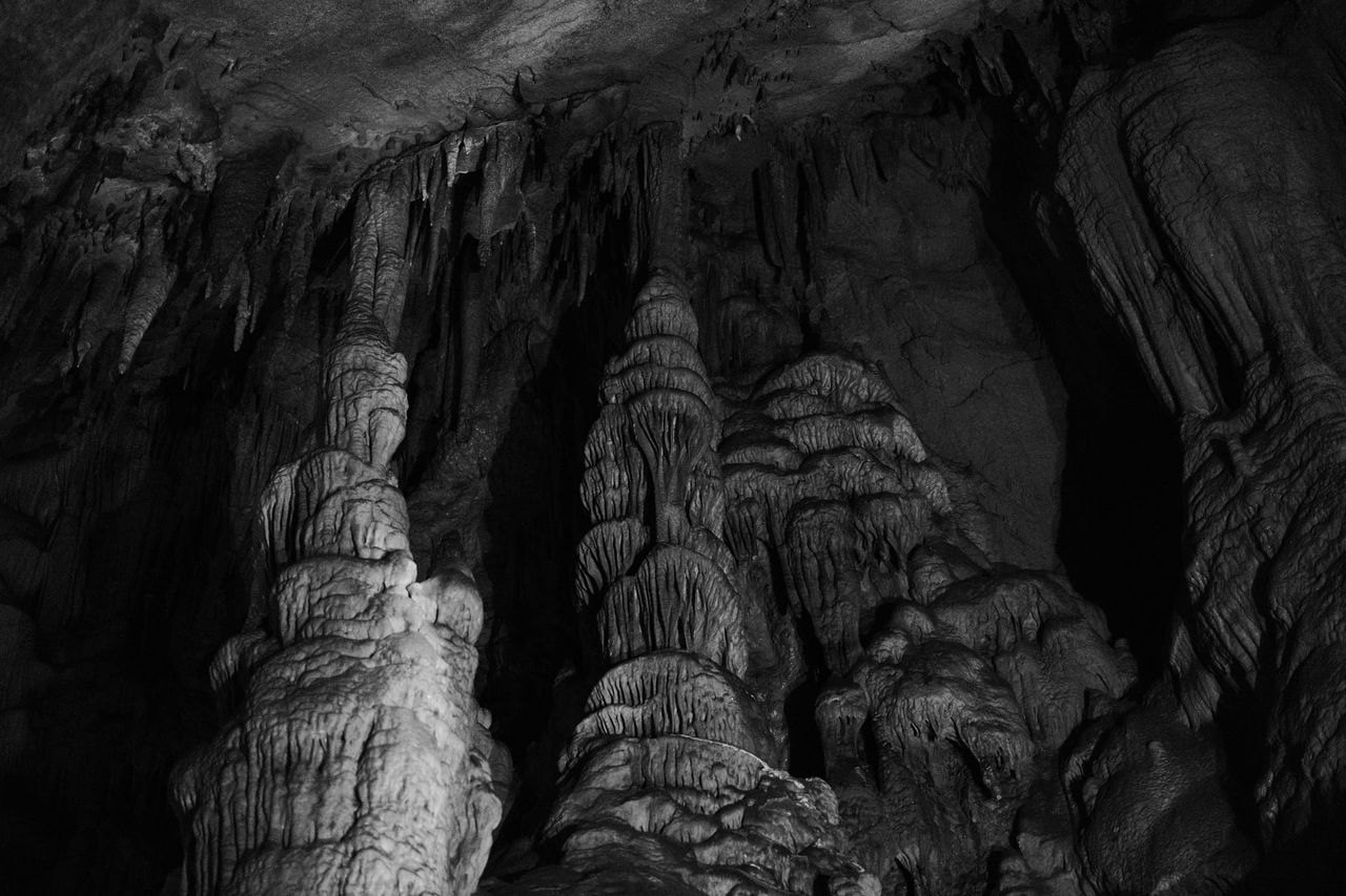 Black-and-white columns of flowstone inside Ledenika Cave