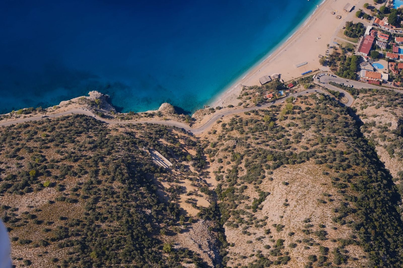 Rocky headland separating Ölüdeniz beach from the blue lagoon