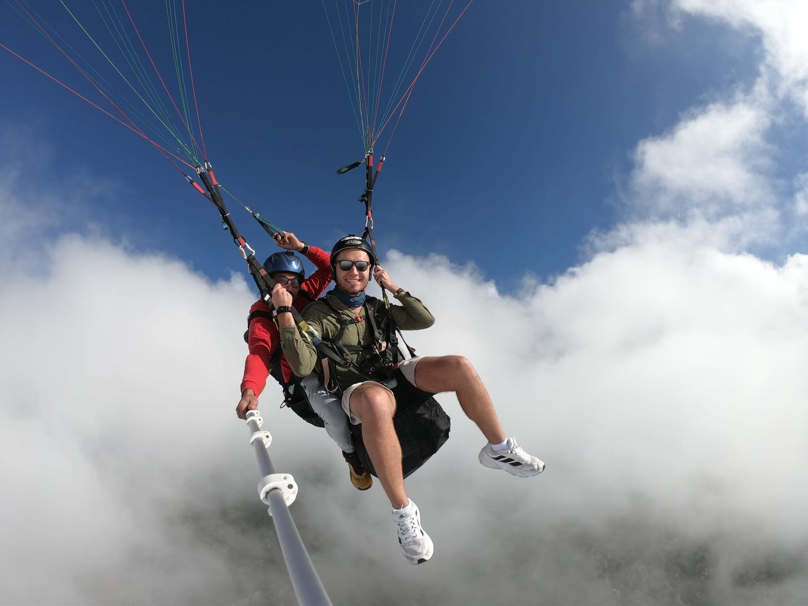 Tandem pair emerging from cloud during the flight