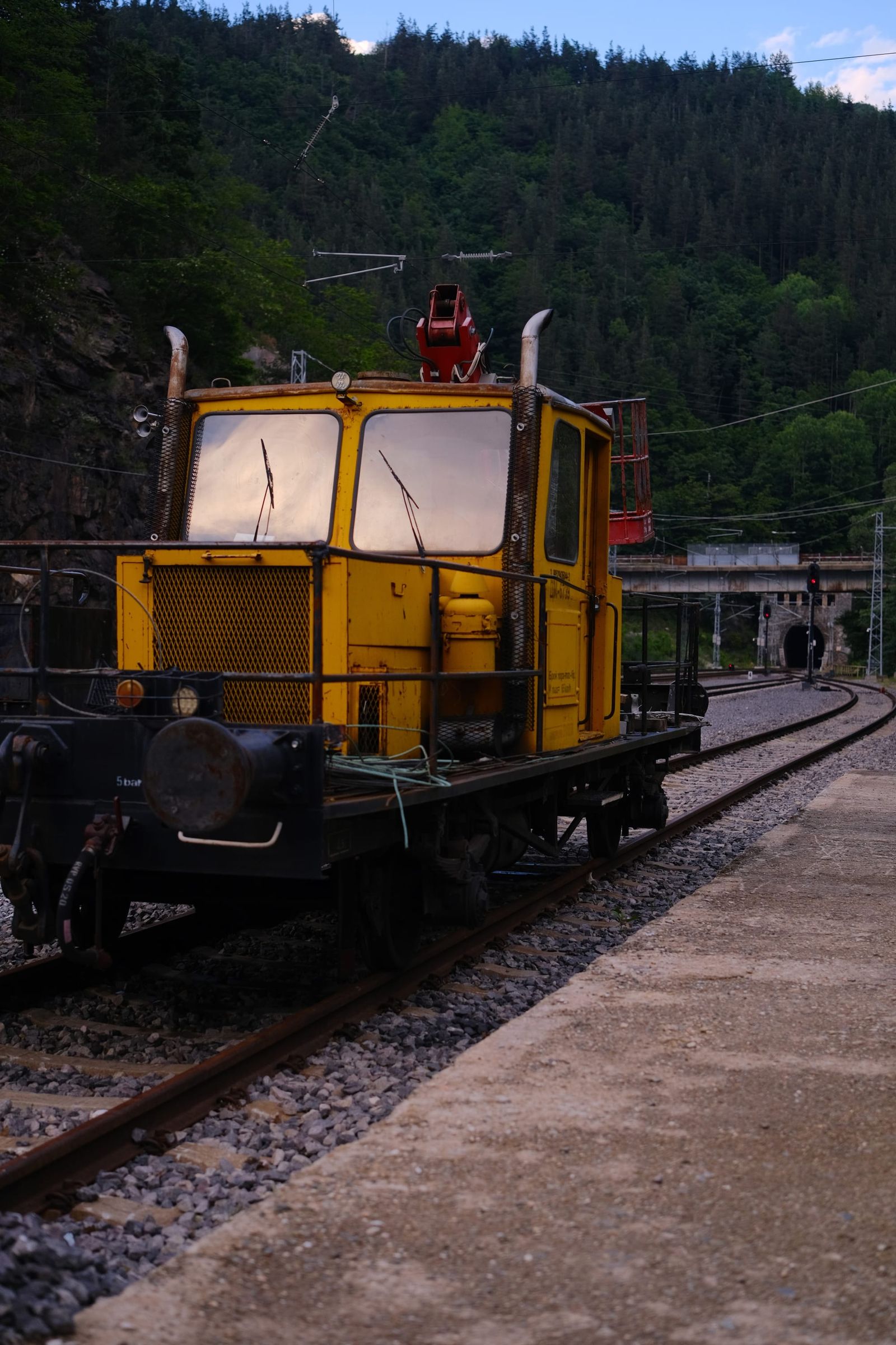 Yellow railway service vehicle at Koprivshtitsa station