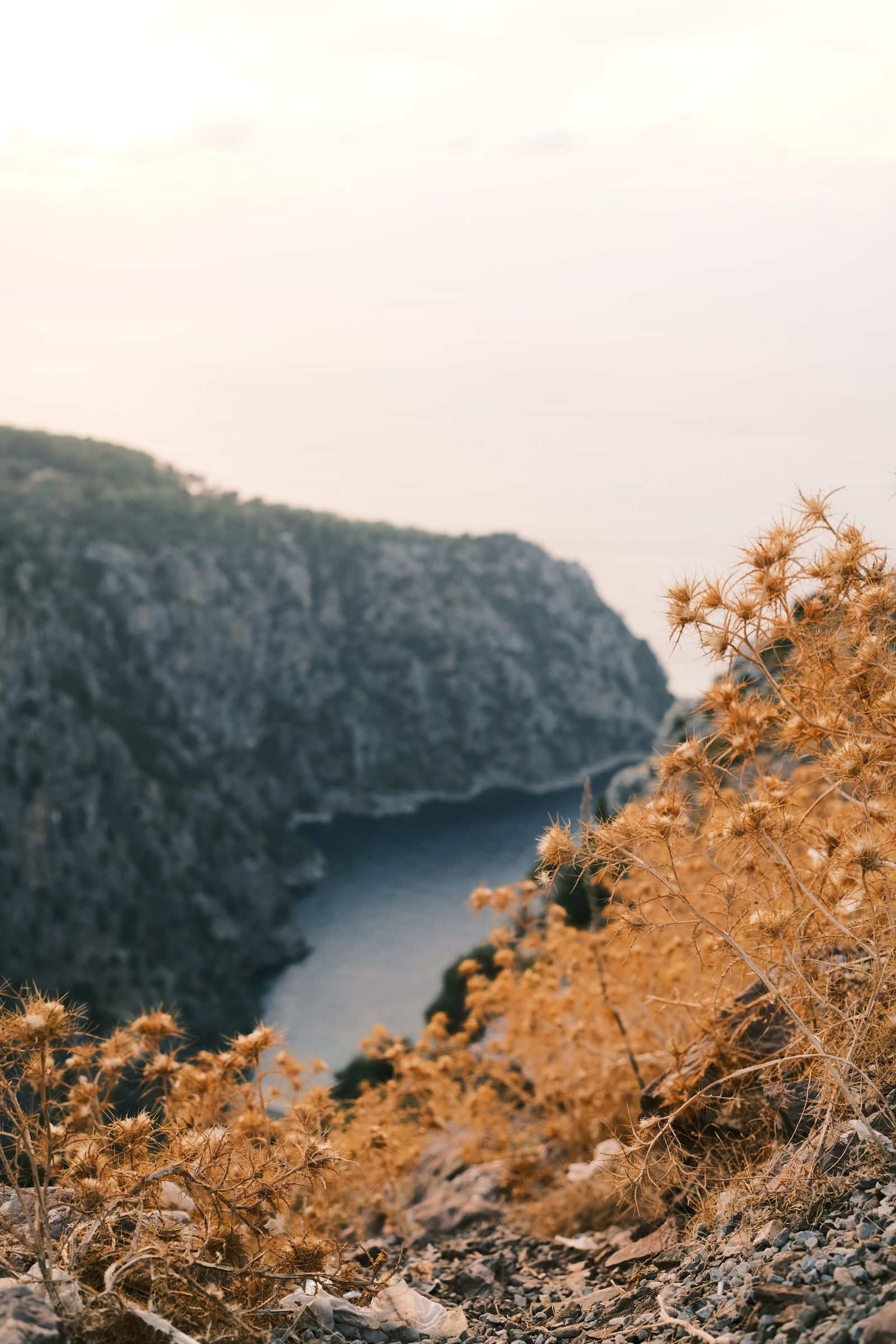 Butterfly Valley cove seen between sunlit rocky slopes