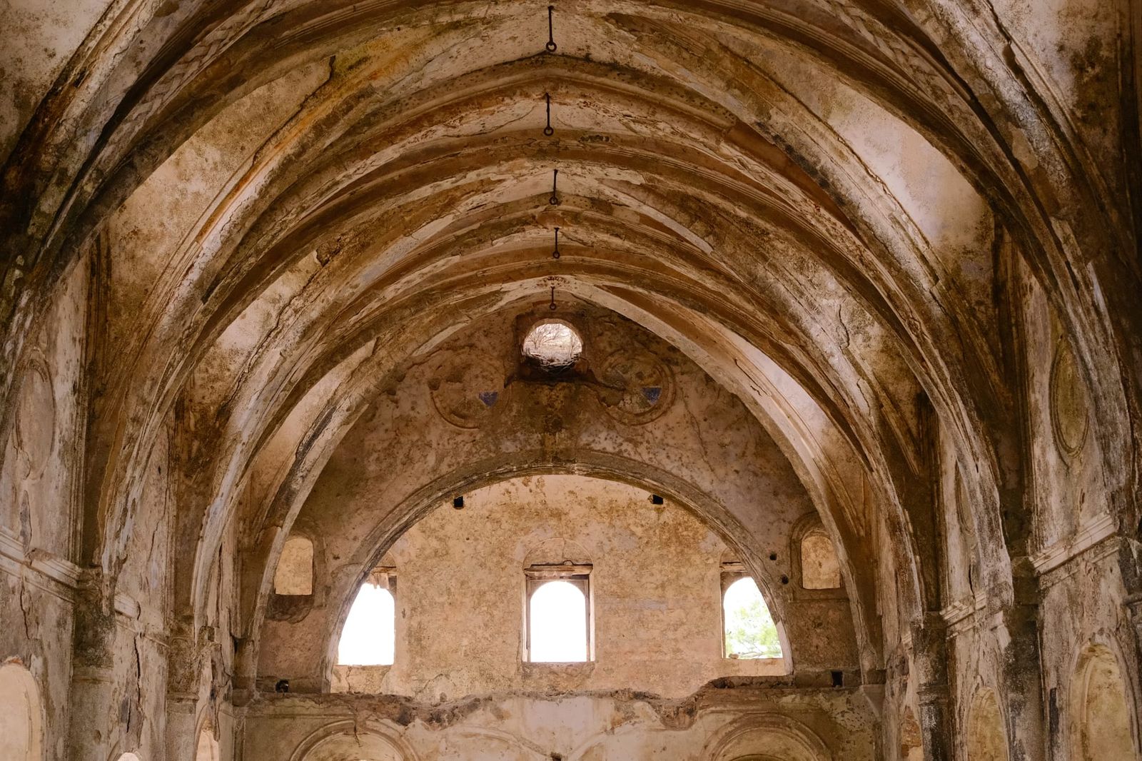 Vaulted stone interior of a roofless church in Kayaköy