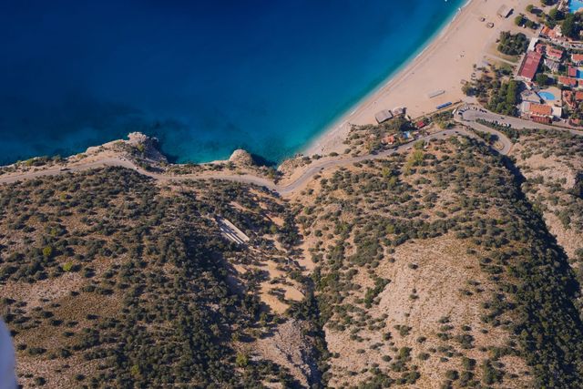 Rocky headland separating Ölüdeniz beach from the blue lagoon