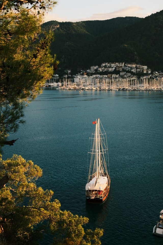 Sailboat anchored in a sheltered turquoise bay near Fethiye
