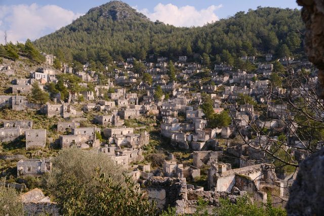 Abandoned stone houses covering the hillside at Kayaköy